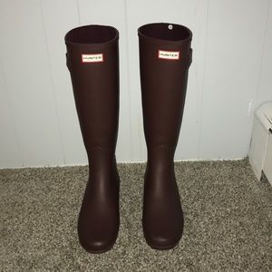 Tall maroon hunter boots